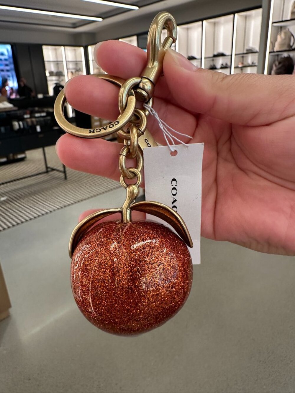 NWT! Coach CBX51 The Summer Turned Pretty™ Peach Bag Charm Keychain In Red/Gold - Picture 1 of 7